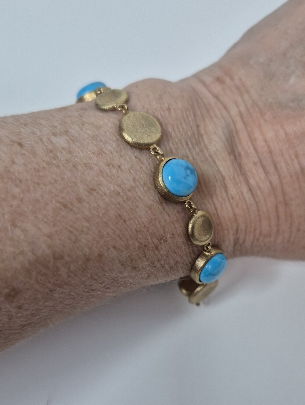 Vintage Rivka Friedman Textured Goldtone Discs w Turquoise Blue Stones Bracelet
